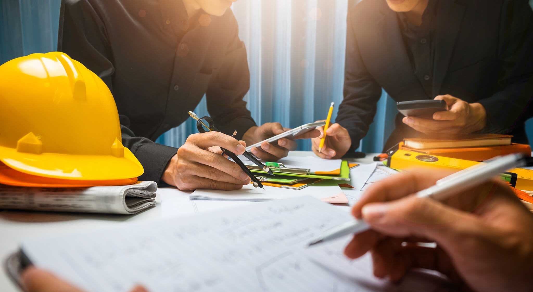 Business man and contractor working in the office construction site